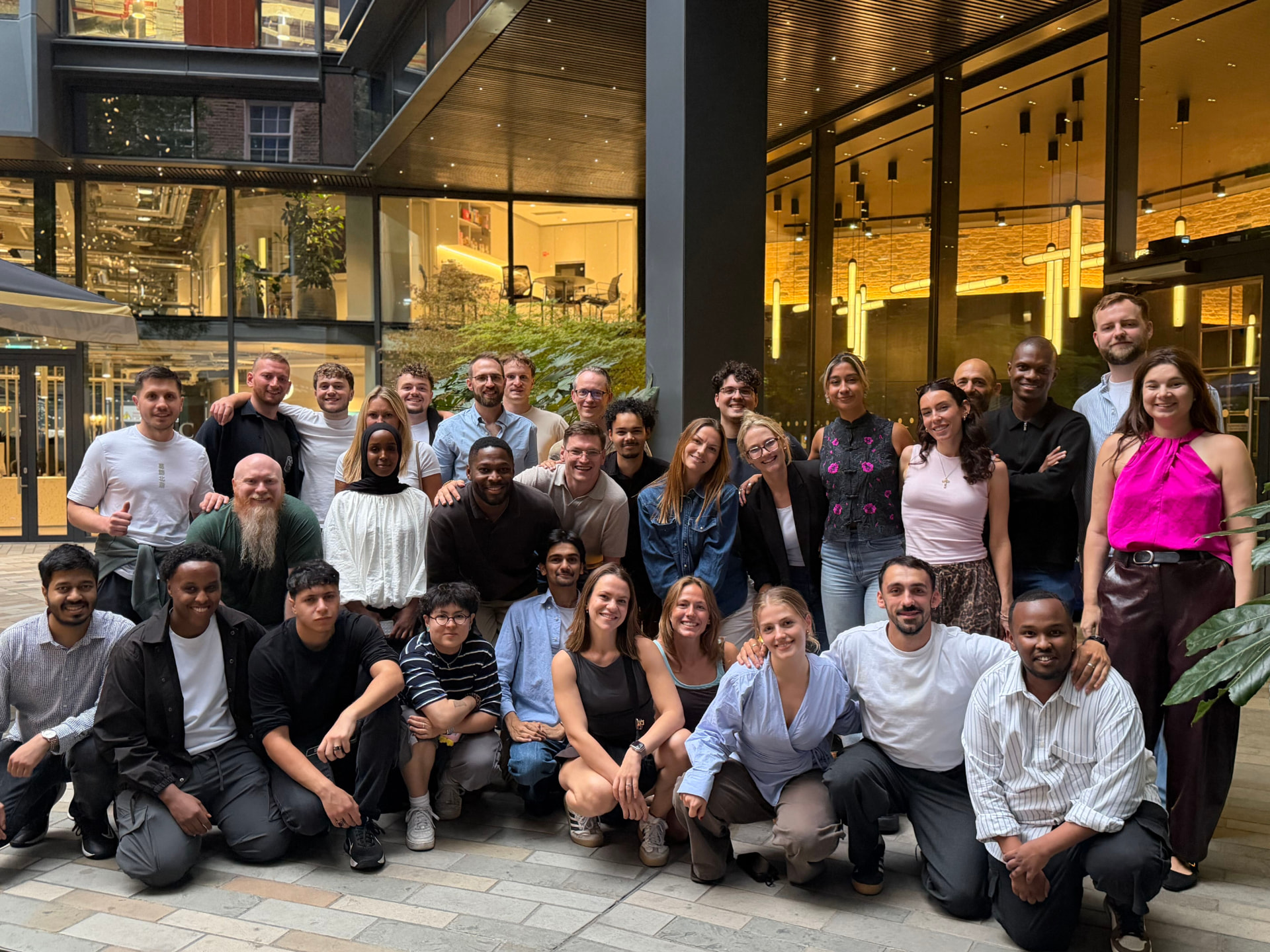 Group photo of the Lifted team together outside the office
