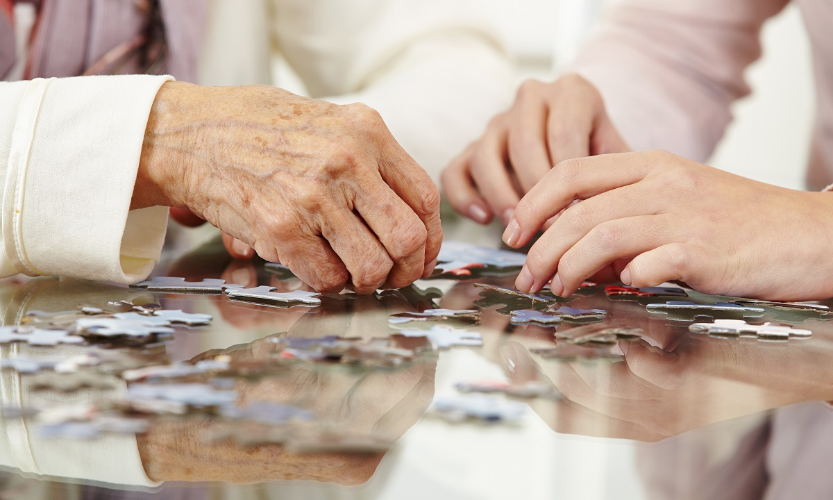 Why does dementia cause suspicions, delusions and paranoia?